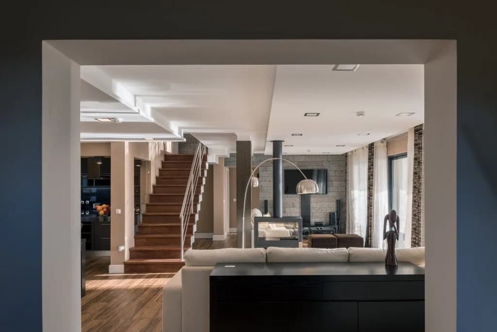 Spacious modern living room with fireplace at Atlantic Heritage, best accommodation in the Azores